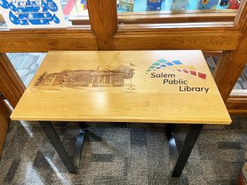 Laser Etched Accent Table For A Library