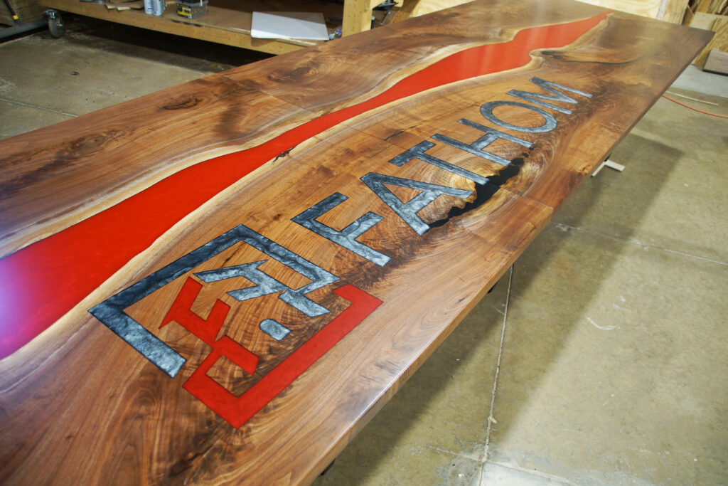 http://CNC%20Logo%20Conference%20Table%20With%20Epoxy%20Gradient%201